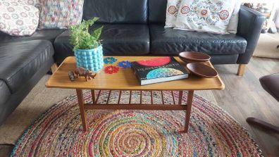 Unusual and Practical Mid-Century Modern Wooden Coffee Table with a Hard-Wearing Wood-Patterned Melamine Top and Slatted Magazine Shelf