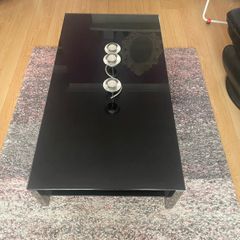 Black glass coffee table.
