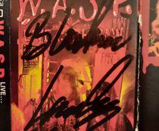 WASP (W.A.S.P.): Live...in The Raw - Cassette (Autographed by Blackie Lawless) (UK 1987)