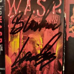 WASP (W.A.S.P.): Live...in The Raw - Cassette (Autographed by Blackie Lawless) (UK 1987)