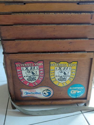 Vintage fishing box with some accessories inside