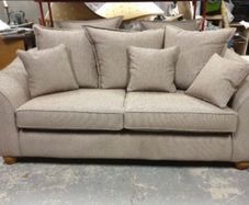 Newly recovered 4 seated  sofa with two chairs