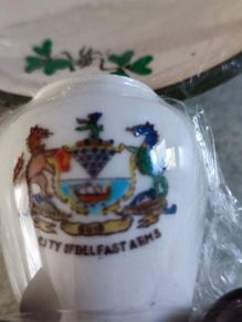 City Of Belfast Arms Small Vase On Wood Holderand Shamrock Saucer.
