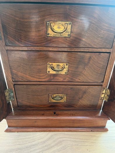 Antique collectors cabinet