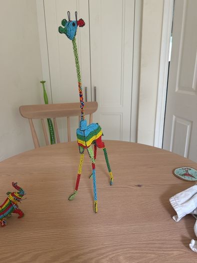 Hand beaded giraffe and elephant