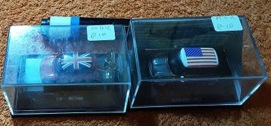 two clear boxed mini's