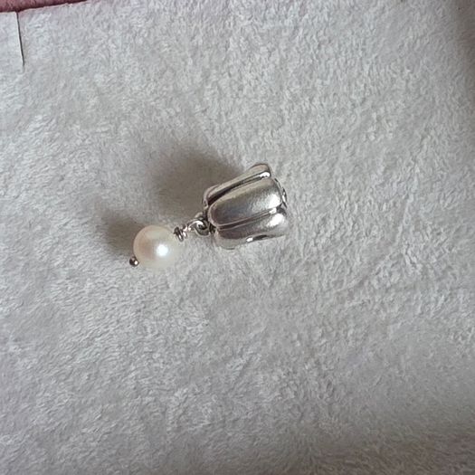 Pandora  charm with pearl drop and purple gemstone in great condition