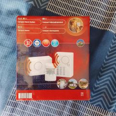Compact alarm system