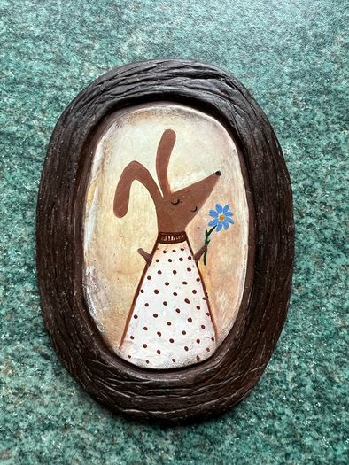 Charming handmade clay wall art