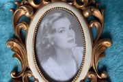 Retro Elegance golden frame at table for an antique touch.