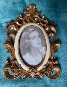 Retro Elegance golden frame at table for an antique touch.