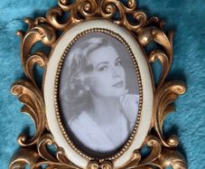 Retro Elegance golden frame at table for an antique touch.