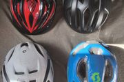 a selection of cycling helmets