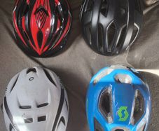 a selection of cycling helmets