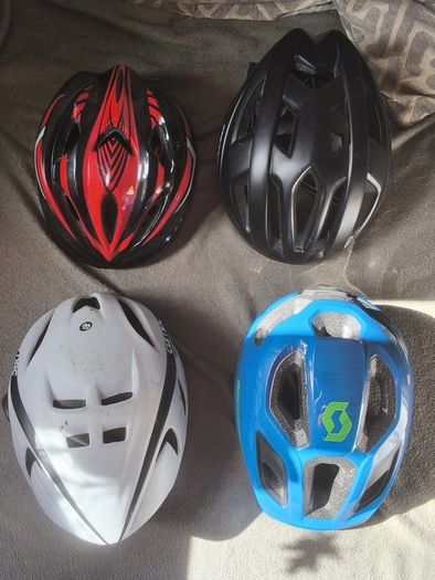 a selection of cycling helmets