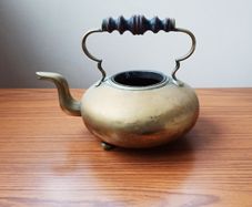 Vintage brass footed tea kettle no lid  height 19cm