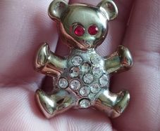 Cute bear brooch with rhinestones.