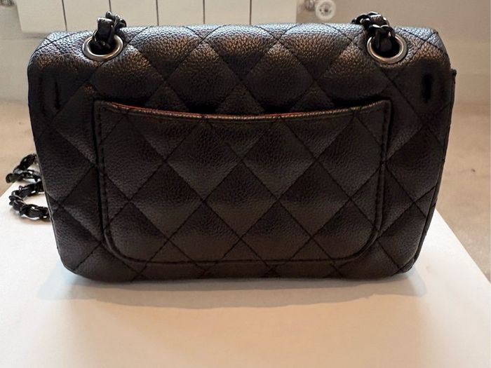 Rare all black C single flap bag.