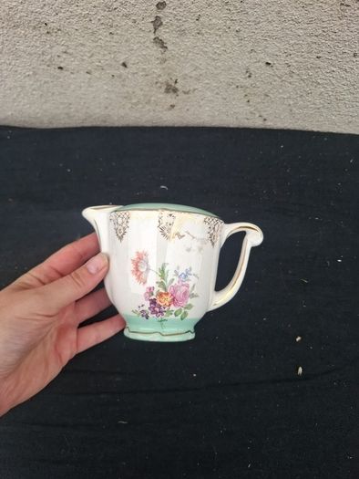 Ceramic vintage milk jug postage possible