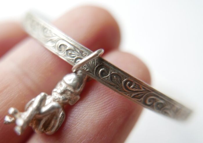 Vintage 925 Sterling Silver bangle with charm