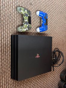 Sony Playstation PS4 Gaming Console Pro 1tb with controllers