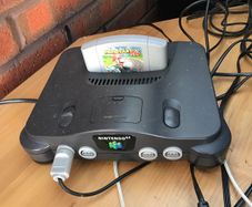 N64 with 2x Controllers along with Mario Kart/1080 Snowboarding