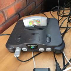 N64 with 2x Controllers along with Mario Kart/1080 Snowboarding