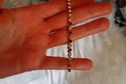 Dark and clear stoned gold tone bracelet