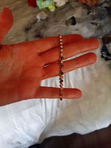 Dark and clear stoned gold tone bracelet