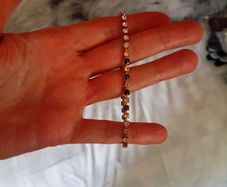 Dark and clear stoned gold tone bracelet