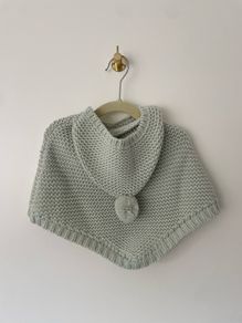 Knitted Baby Poncho by Katie Loxton