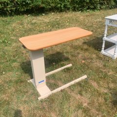 Adjustable height table for the infirm