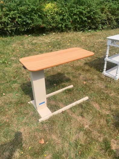 Adjustable height table for the infirm