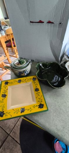 3 different items. No. 1- Mid-Century Porcelain Teapots, Japan, 1960.  95.00 euro. 2- VTG Hand Painted Le Poet Laval France Serving Plate 22.00 euro. 3- Vintage Short Dark Forest Green Ceramic 22.00 euro.