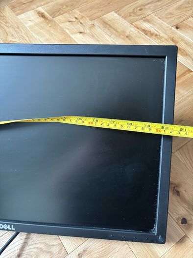 Dell monitor with adjustable stand that clamps to desk