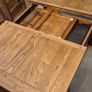 Extendable oak table with 5 matching chairs Image 4