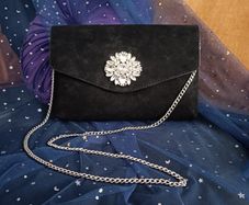 Black clutch with silver details