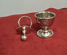 silver plated egg cup and soother