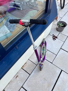 Micro purple two-wheeled scooter