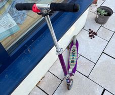 Micro purple two-wheeled scooter