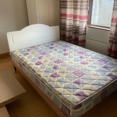 Double Bed with white headboard