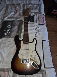 Childs Burnwood electric guitar.