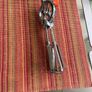 Vintage whisk , steel with orange bakelite handle Image 4