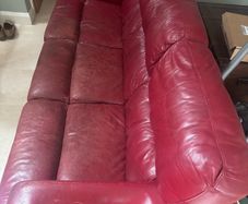 red leather couch/sofa