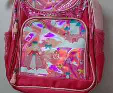 New pink  backpack tag attached