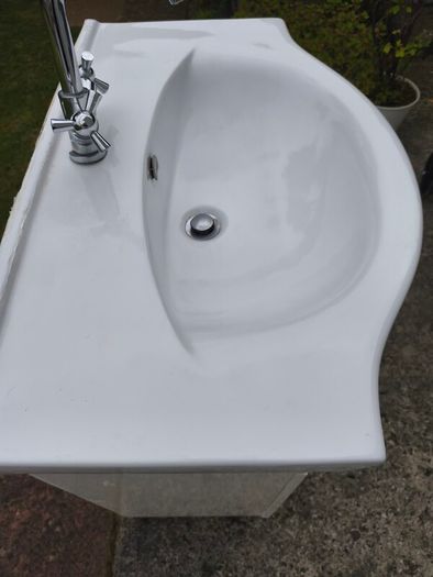 sink with mixer tap and cabinet