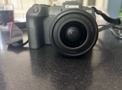 canon Camera EOS RP with 24-50 mm F4.5-6.3 IS STM. This camera has literally never been used!. My daughter bought it in Conns Cameras in Dublin City and NEVER used it. Camera and lens comes with original boxes ( as new) and the shopping bag. Camera also c