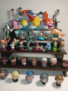 Collection Of Disney Figures Doorables, Jake , Sleeping Beauty, Nemo,Tomorrowland G/c