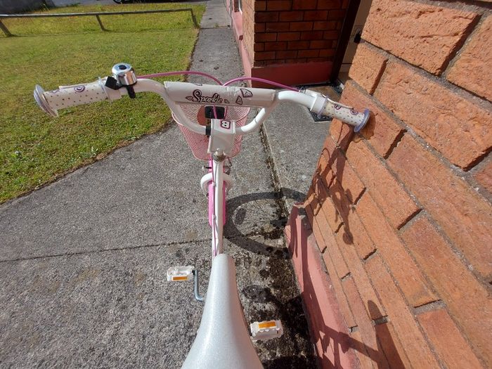 GIRLS BIKE (Sparkle) with Basket, 20 inch wheels, in excellent condition. See Pictures