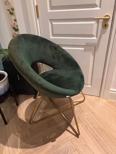 Dark green velvet moon chair with gold legs